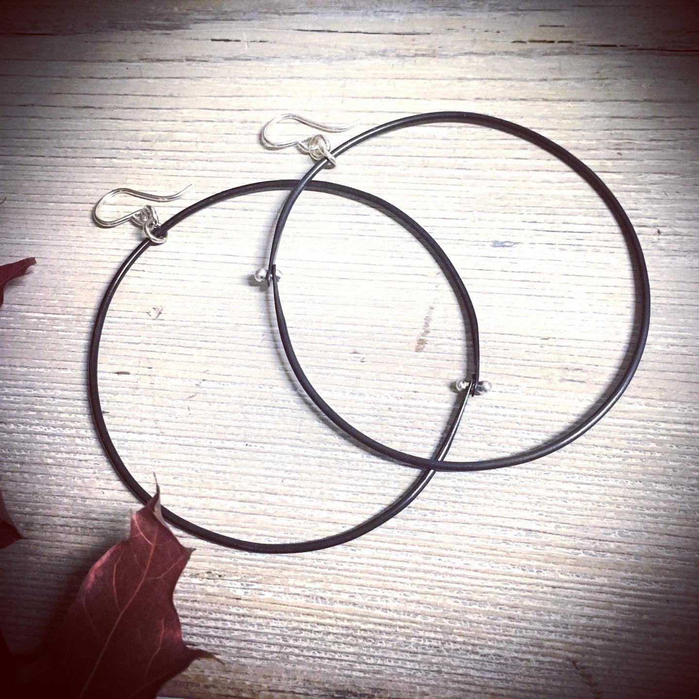 Black 70MM Hoop Earrings | Claire's